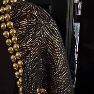 Women’s Long medium weight cotton coat with metal adornments